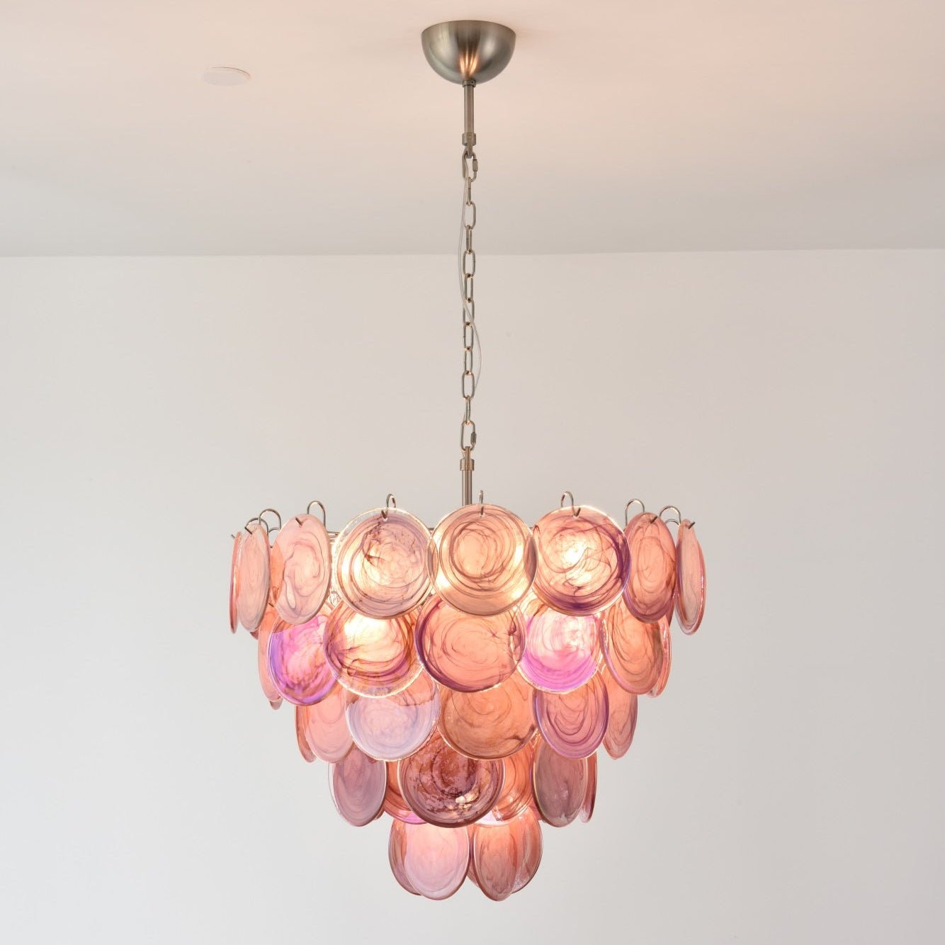 Elegant Pink Glass Disc Chandelier with Adjustable Height & Soft Light