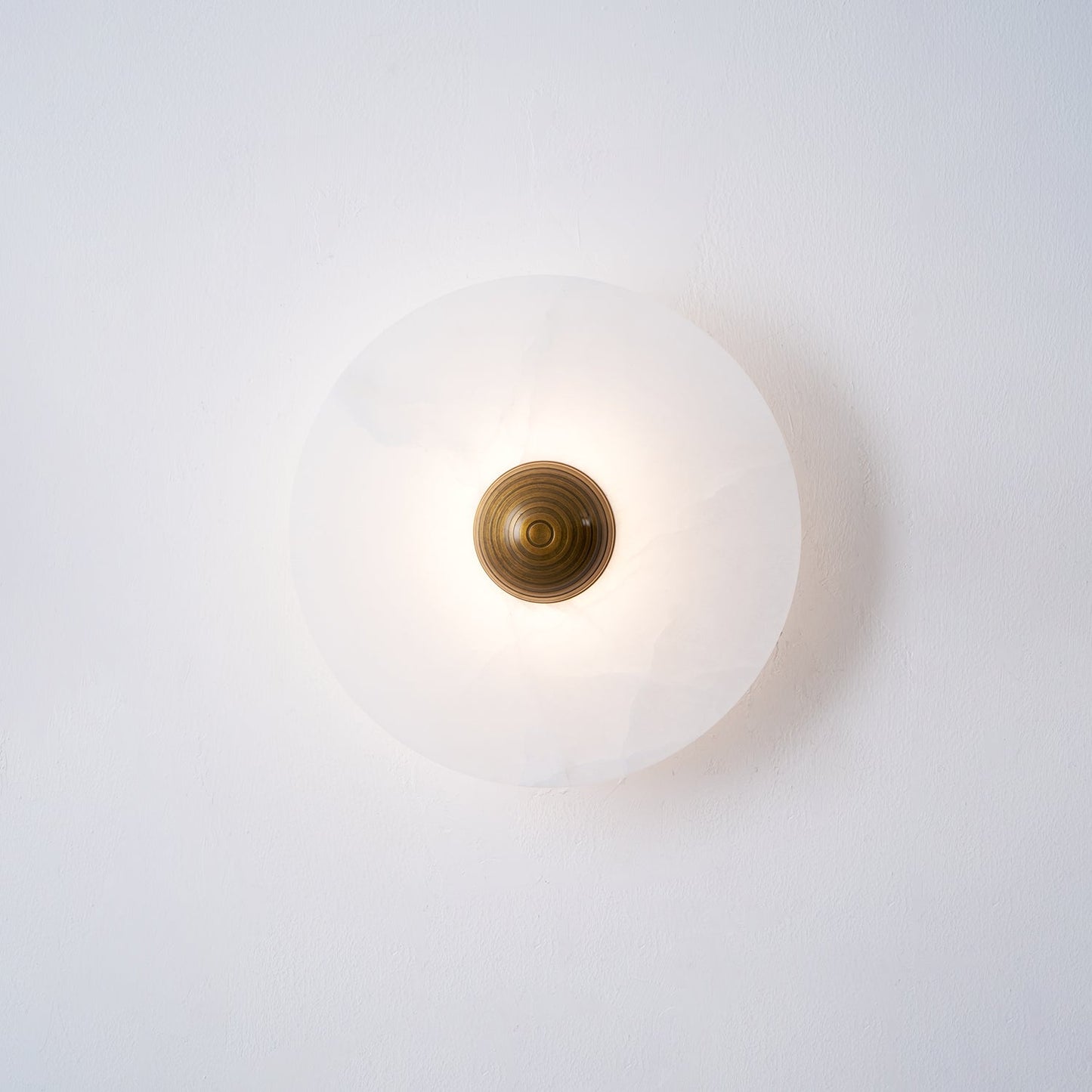 Nayra Alabaster Wall Lamp - Elegant Design with Adjustable Light Direc