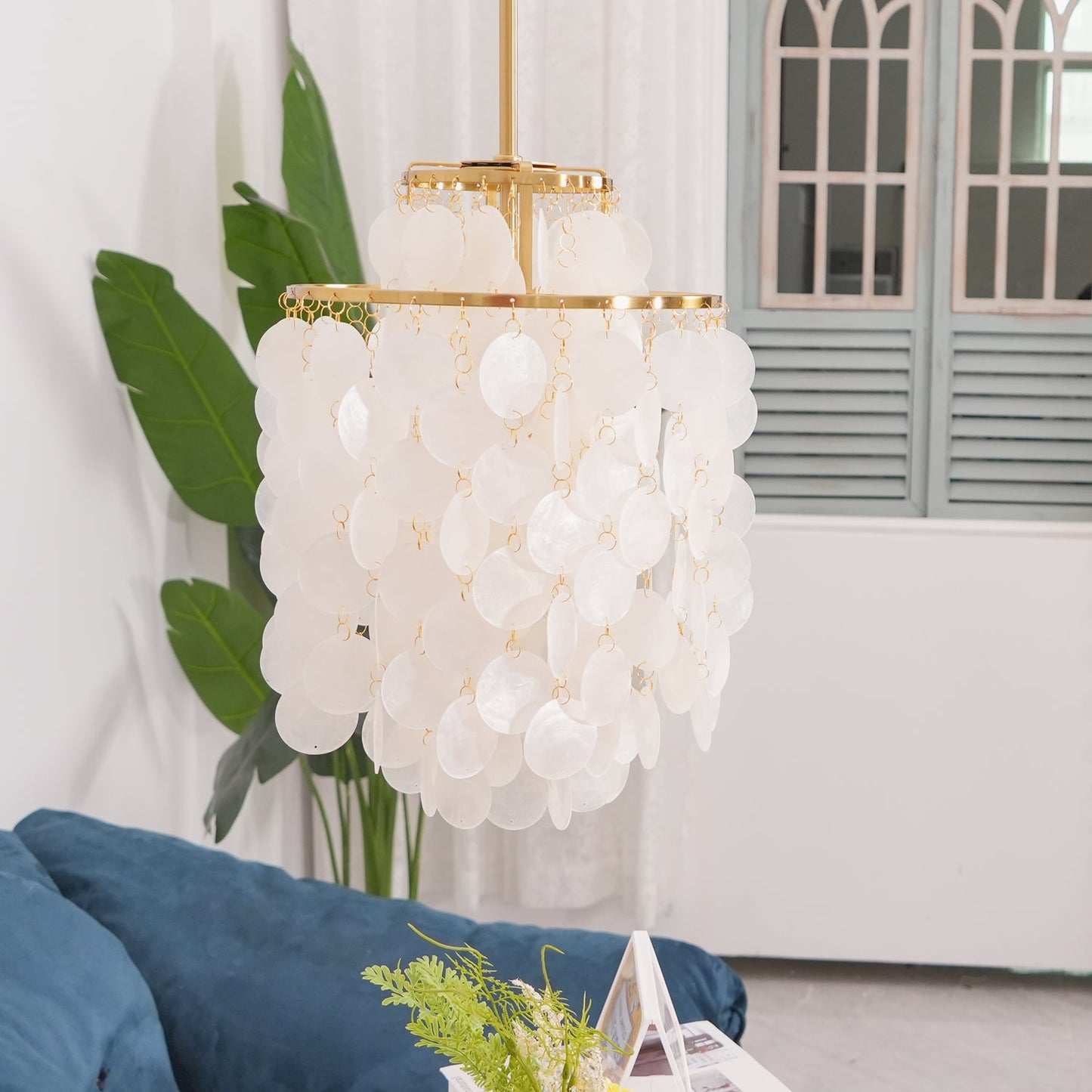 Elegant Round Shell Chandelier with Adjustable Height & Soft Lighting