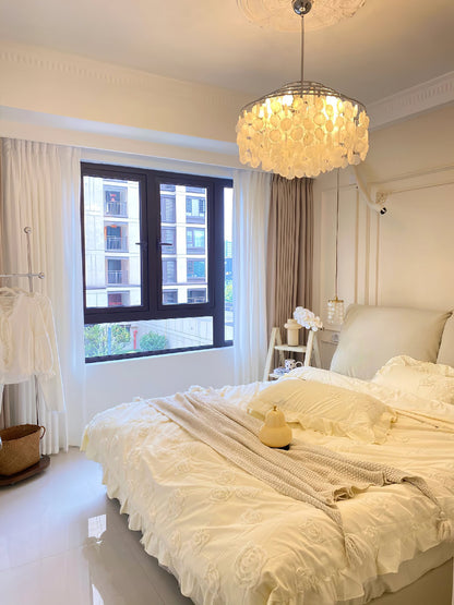 Elegant Round Shell Chandelier with Adjustable Height & Soft Lighting