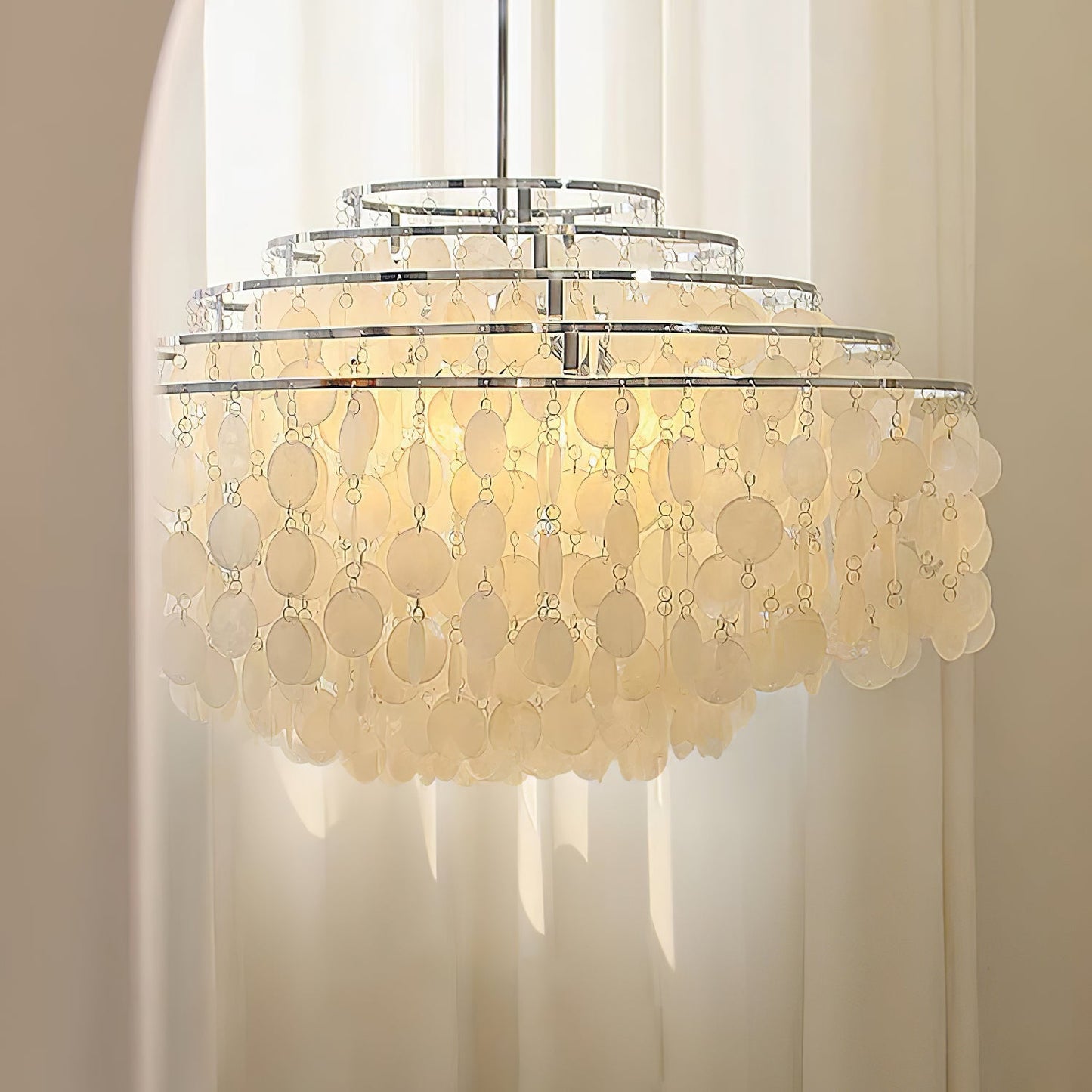 Elegant Round Shell Chandelier with Adjustable Height & Soft Lighting