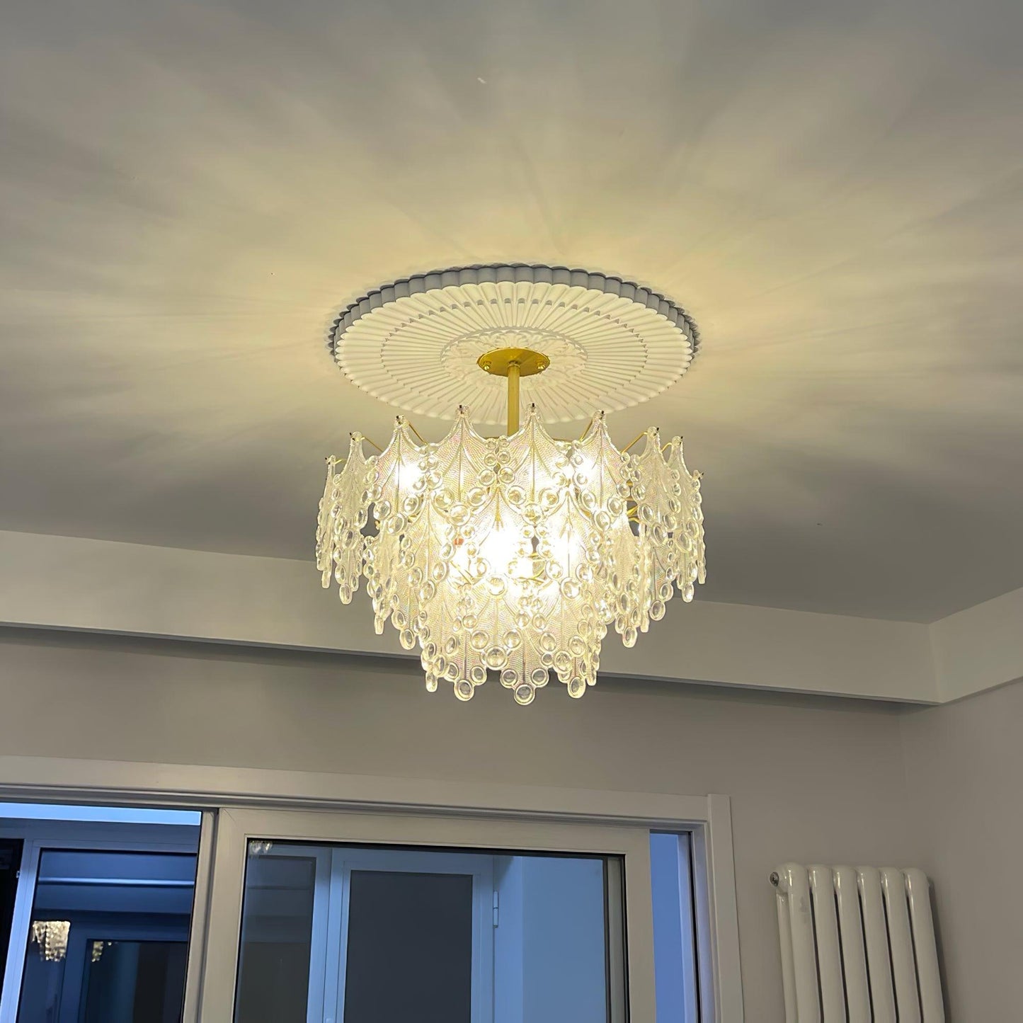 Elegant Tiered Carved Glass Chandelier with Adjustable Height & LED Co