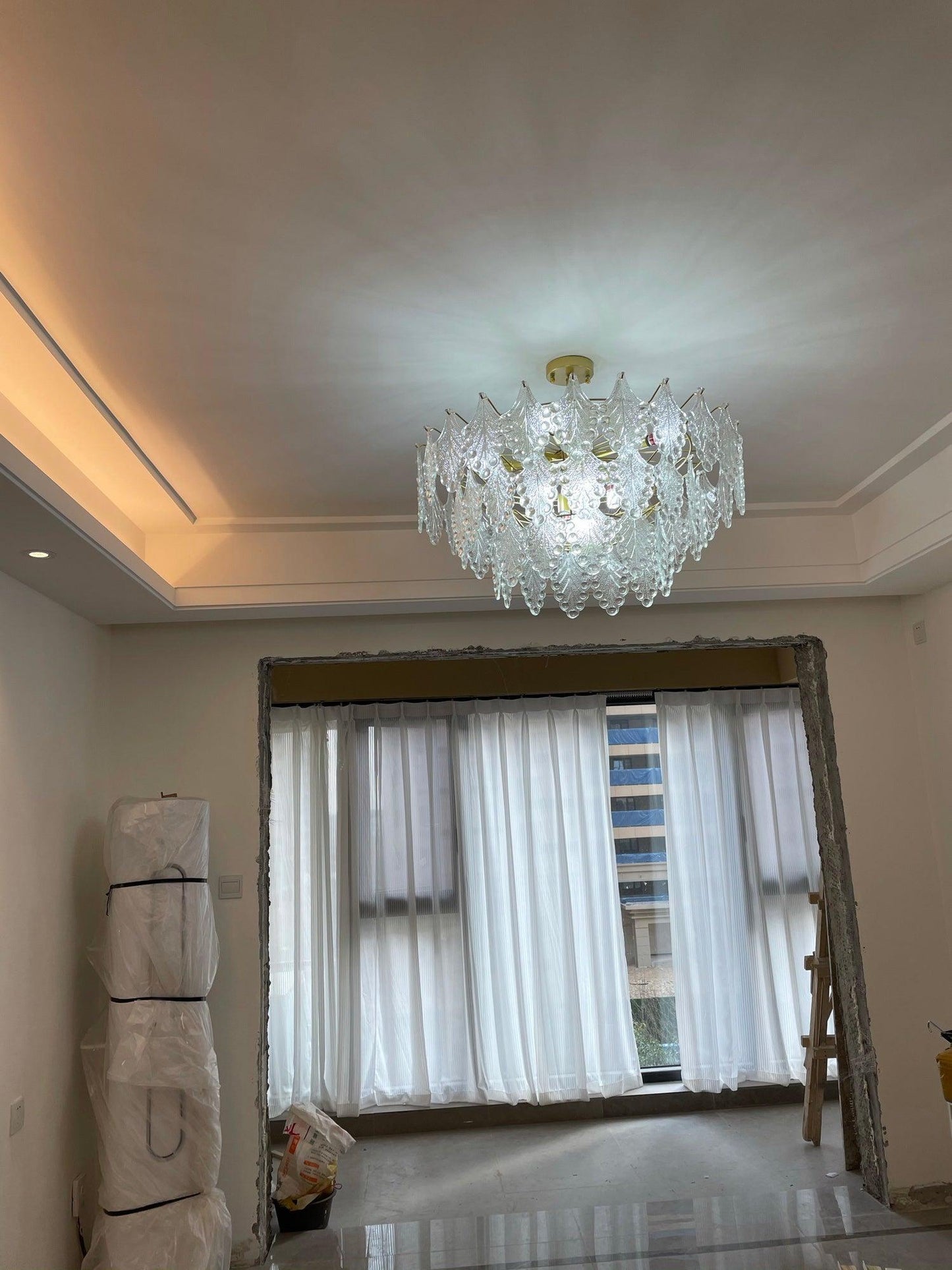 Elegant Tiered Carved Glass Chandelier with Adjustable Height & LED Co