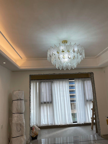 Elegant Tiered Carved Glass Chandelier with Adjustable Height & LED Co